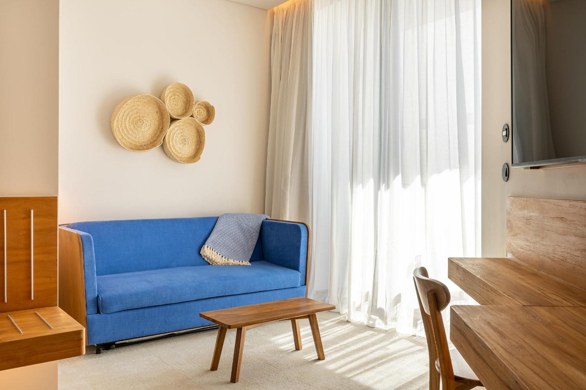 Hotel 3HB Distrikt Faro Zimmer foto A living room at the hotel