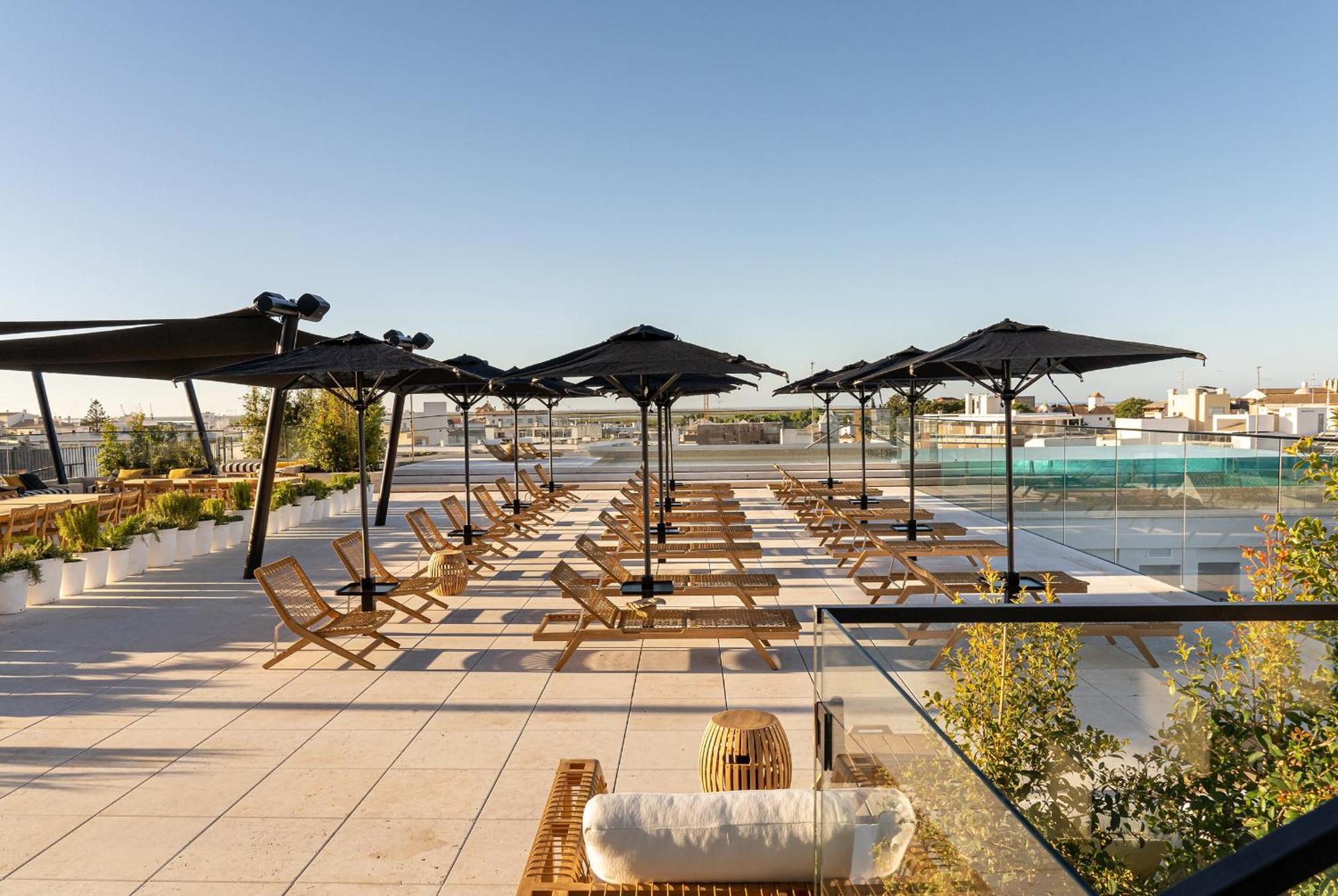 Hotel 3HB Distrikt Faro Exterior foto The rooftop terrace